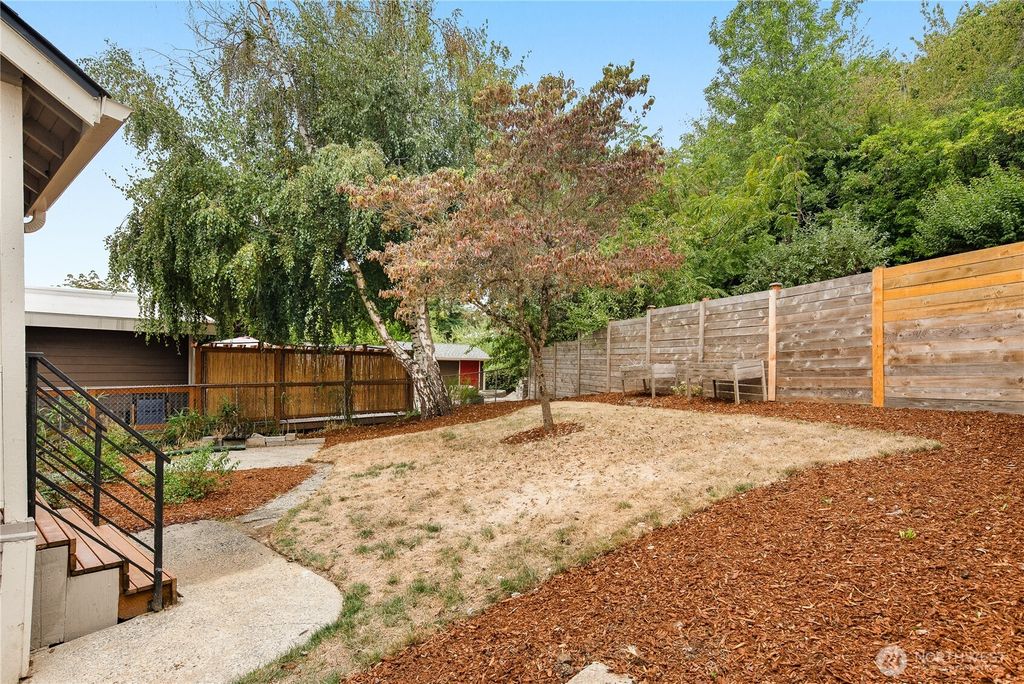 Photo of 4832 S Graham Street, Seattle, WA 98118 (MLS # 2432366)