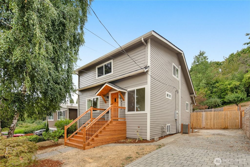 Photo of 4832 S Graham Street, Seattle, WA 98118 (MLS # 2432366)