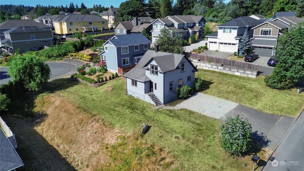 Photo of 4803 S 144th Street, Tukwila, WA 98168 (MLS # 2264731)