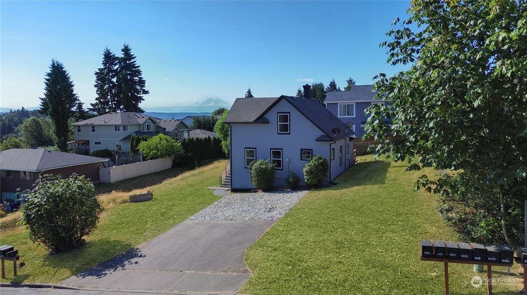 Photo of 4803 S 144th Street, Tukwila, WA 98168 (MLS # 2264731)