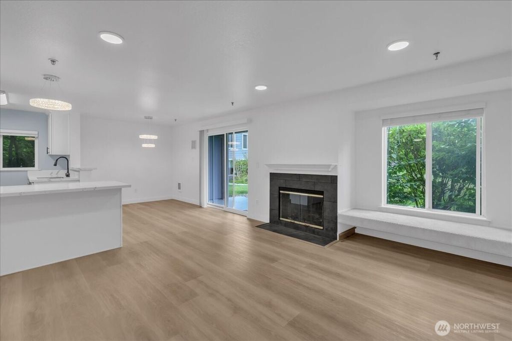 Photo of 12510 109th Ct NE #E101, Kirkland, WA 98034 (MLS # 2426737)