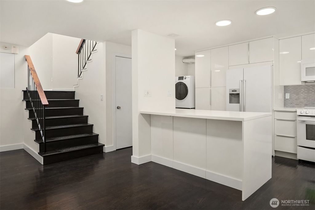 Photo of 202 W Olympic Place #405, Seattle, WA 98119 (MLS # 2418178)