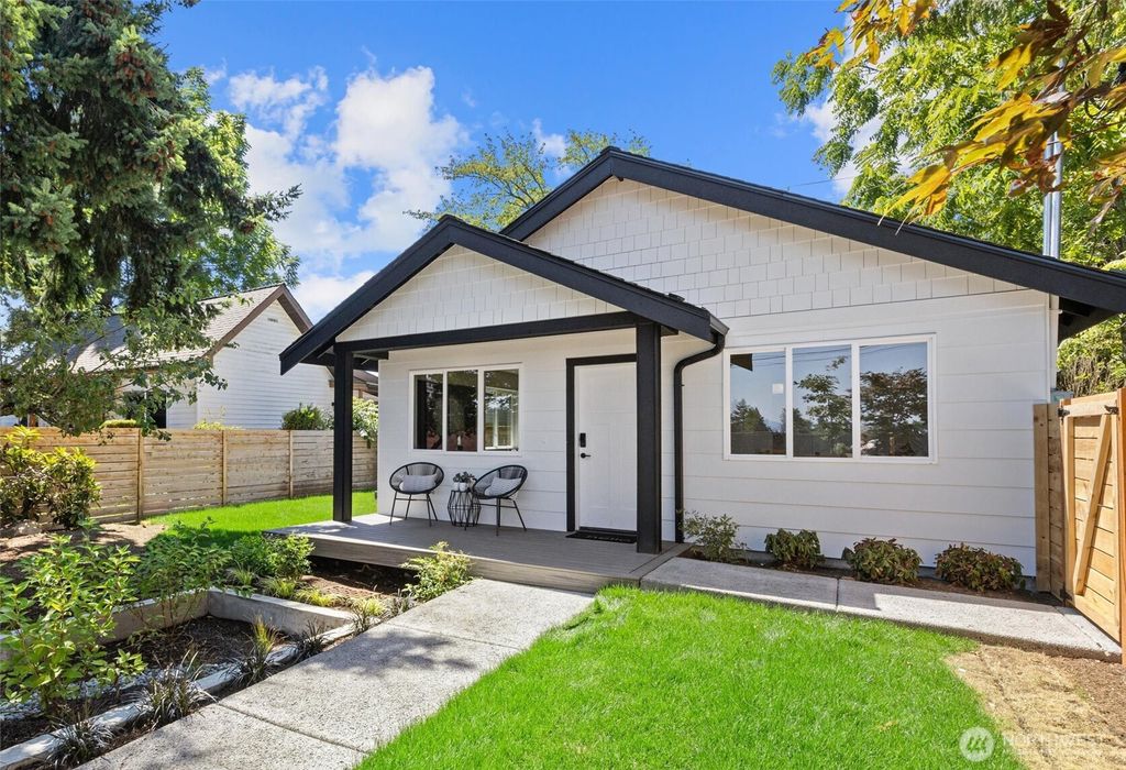 Photo of 7711 34th Avenue SW, Seattle, WA 98126 (MLS # 2412782)