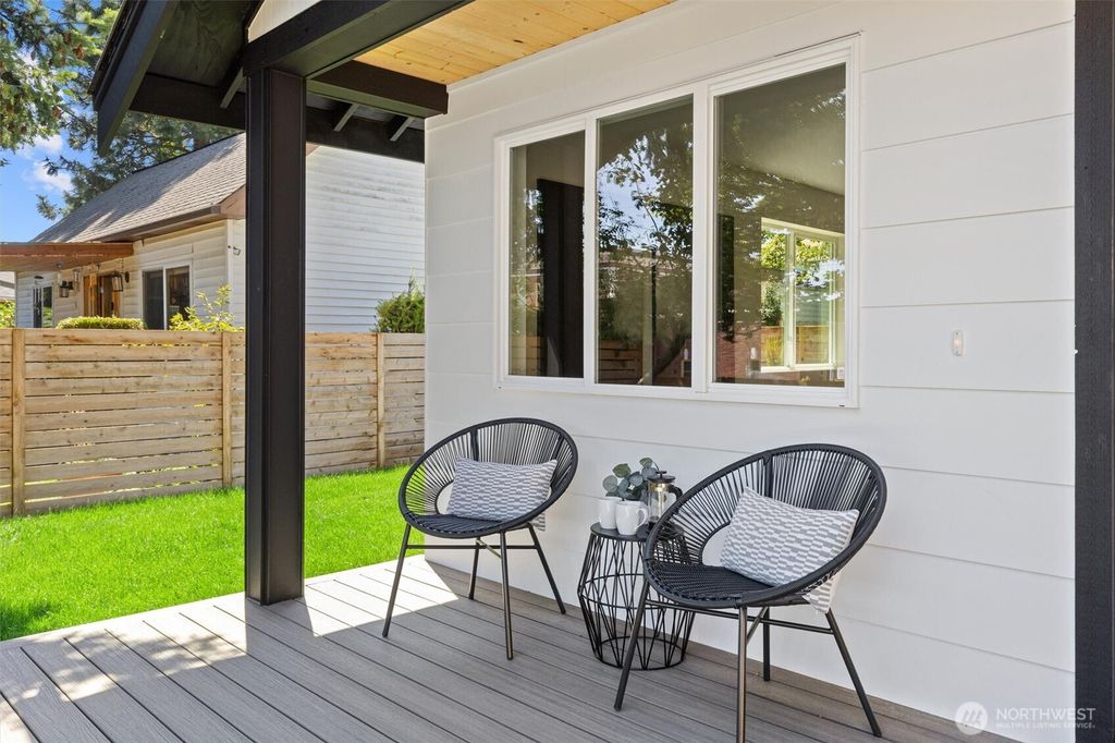 Photo of 7711 34th Avenue SW, Seattle, WA 98126 (MLS # 2412782)