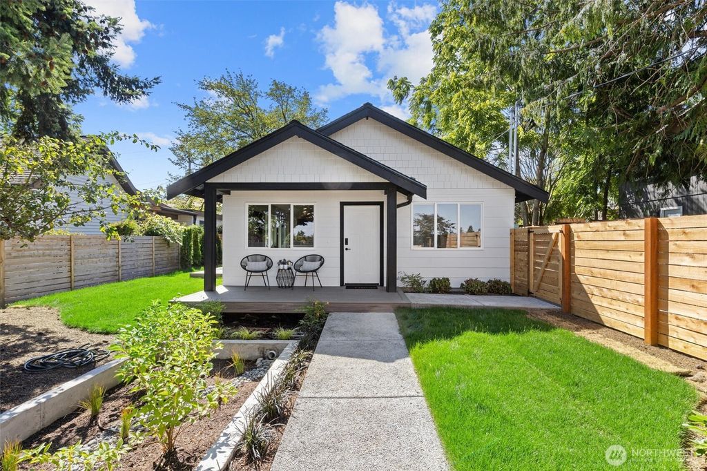 Photo of 7711 34th Avenue SW, Seattle, WA 98126 (MLS # 2412782)