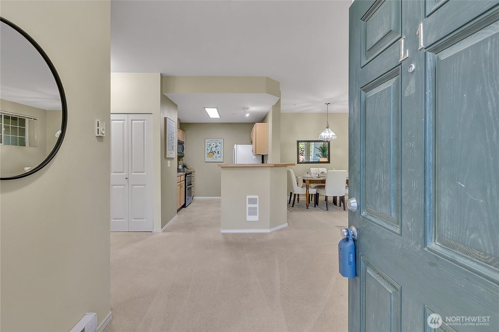 Photo of 15325 SE 155th Place #L-1, Renton, WA 98058 (MLS # 2409268)