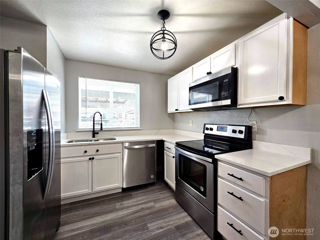 Photo of 10318 15th Avenue Ct E, Tacoma, WA 98445 (MLS # 2498326)