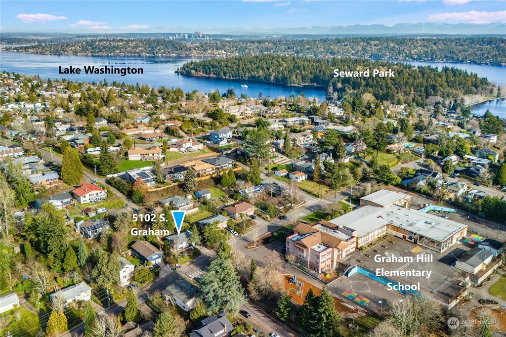 Photo of 5102 S Graham Street, Seattle, WA 98118 (MLS # 2324446)