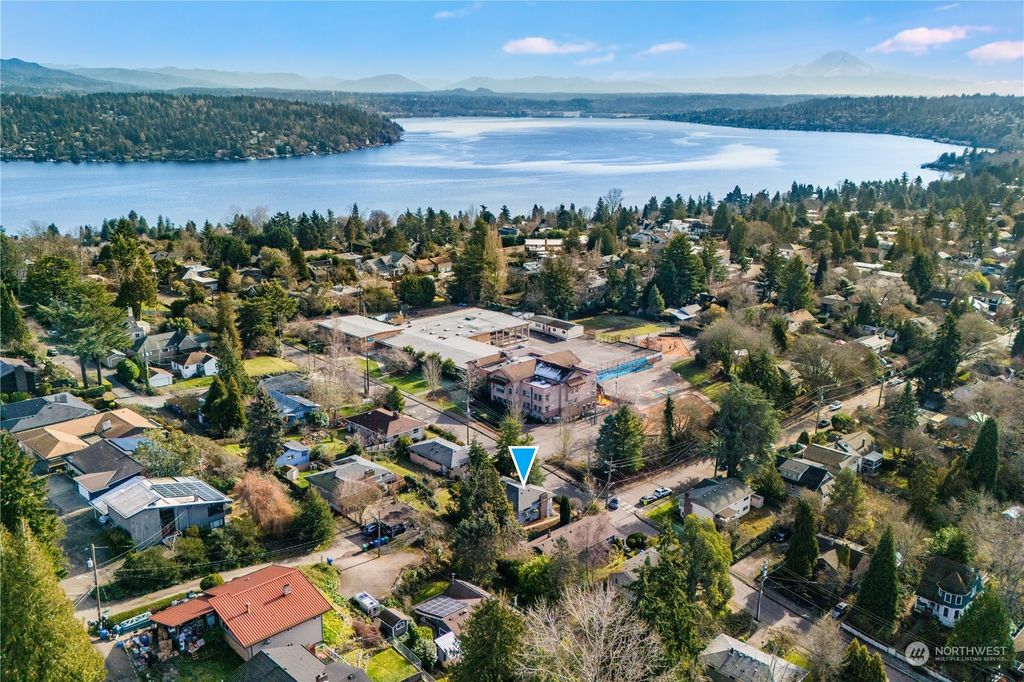 Photo of 5102 S Graham Street, Seattle, WA 98118 (MLS # 2324446)