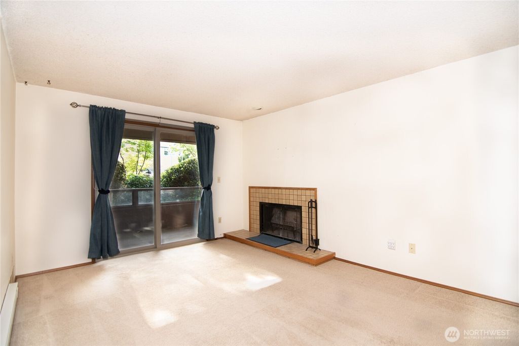 Photo of 3421 SW Roxbury Street #106, Seattle, WA 98126 (MLS # 2415055)