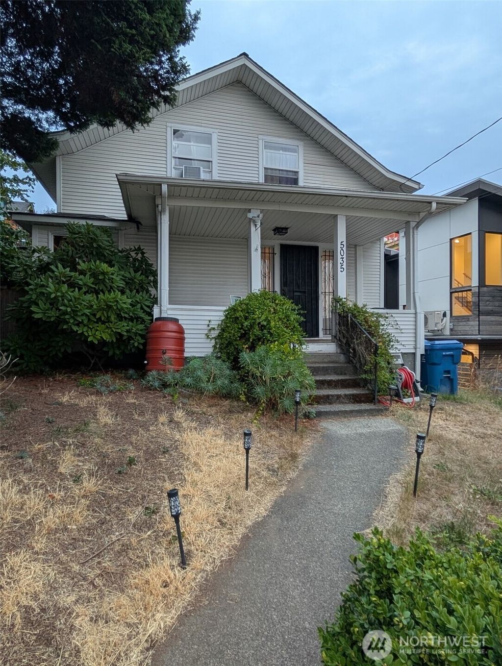Photo of 5035 35th Avenue S, Seattle, WA 98118 (MLS # 2425856)