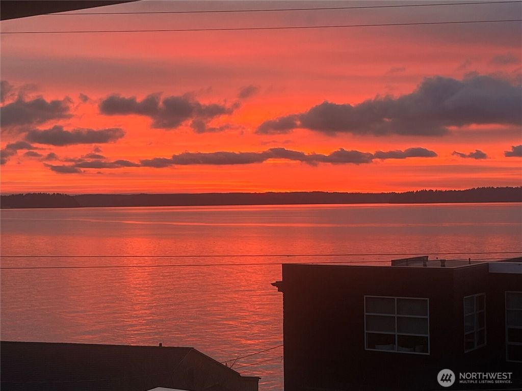 Photo of 5064 Beach Drive SW, Seattle, WA 98136 (MLS # 2476814)