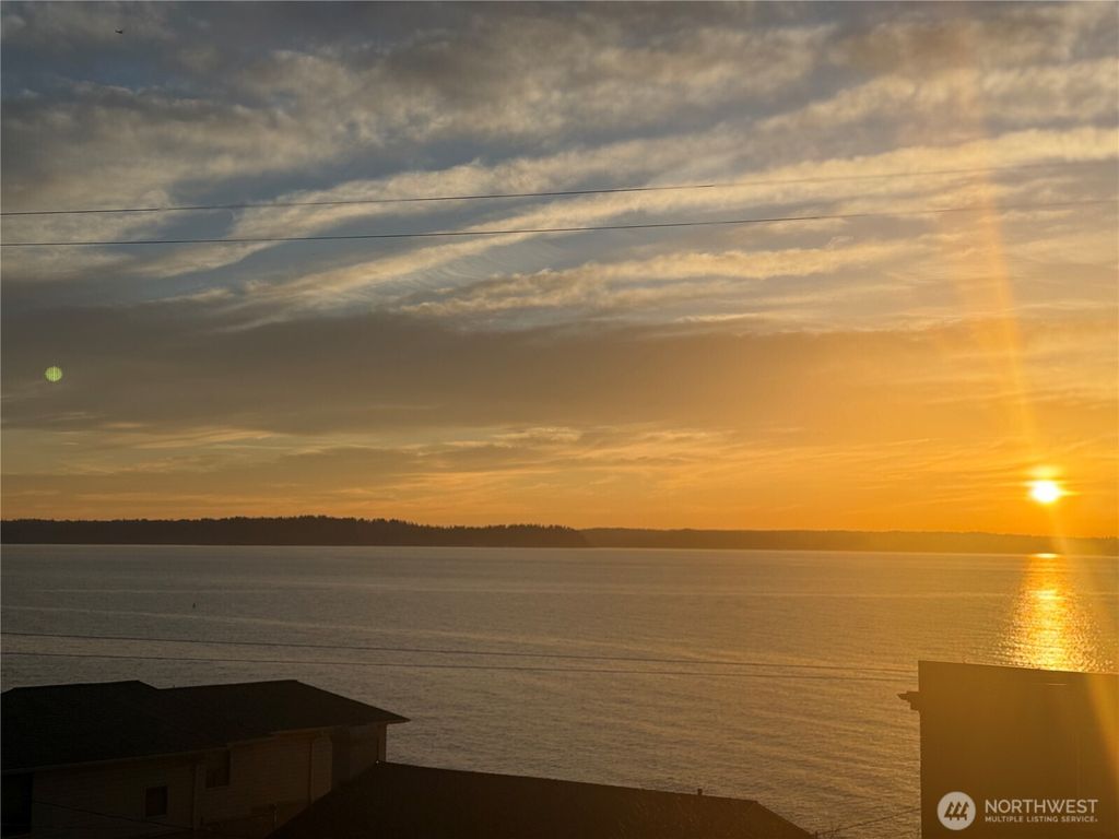 Photo of 5064 Beach Drive SW, Seattle, WA 98136 (MLS # 2476814)