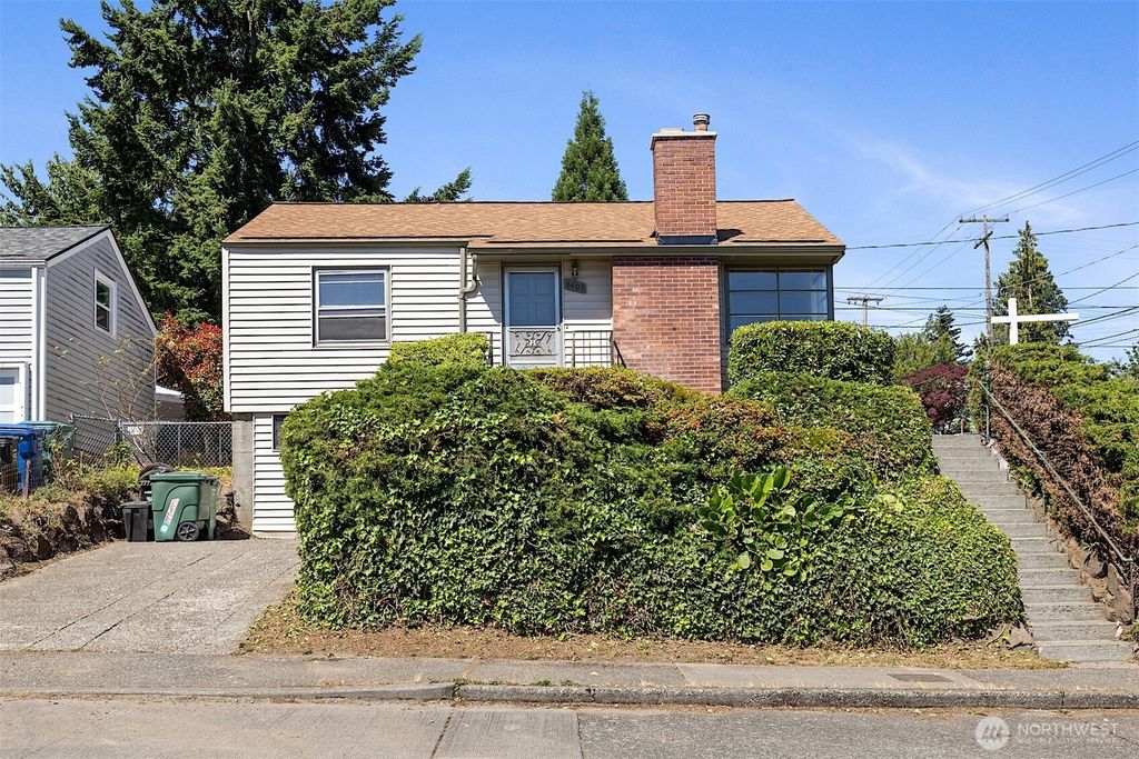 Photo of 8403 36th Avenue SW, Seattle, WA 98126 (MLS # 2406925)