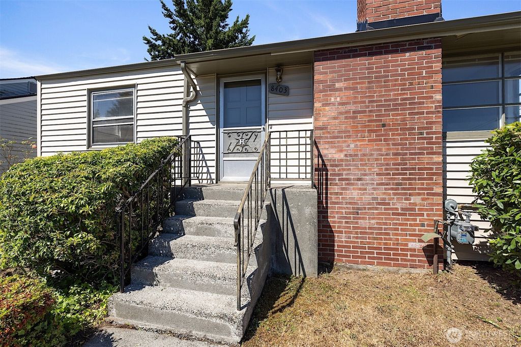 Photo of 8403 36th Avenue SW, Seattle, WA 98126 (MLS # 2406925)
