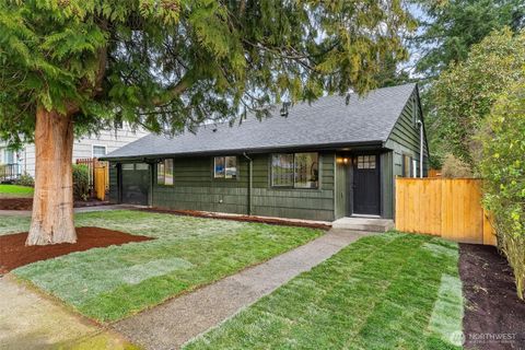 Photo of 8418 31st Avenue SW, Seattle, WA 98126 (MLS # 2474615)