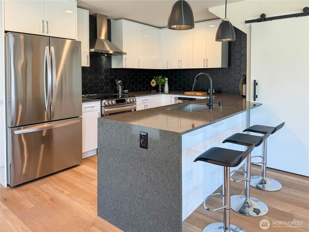 Photo of 6903 42nd Avenue S, Seattle, WA 98118 (MLS # 2396409)