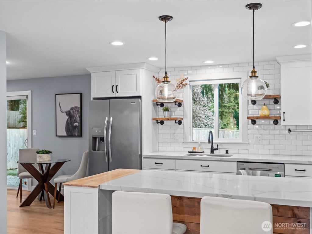 Photo of 12824 97th Place NE, Kirkland, WA 98034 (MLS # 2476500)