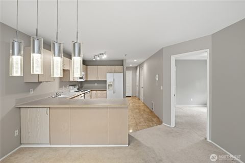 Photo of 18210 73rd Avenue NE #201, Kenmore, WA 98028 (MLS # 2513538)