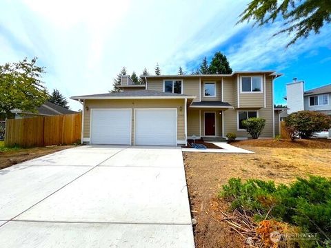 Photo of 10900 SE 219th Place, Kent, WA 98031 (MLS # 2479045)