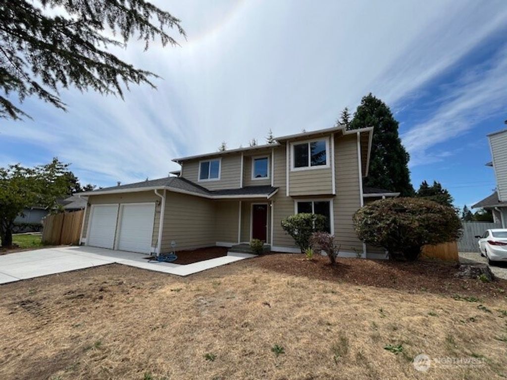 Photo of 10900 SE 219th Place, Kent, WA 98031 (MLS # 2479045)