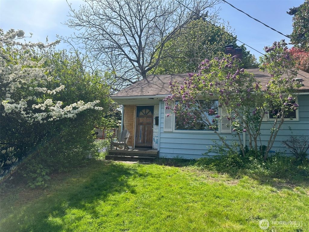 Photo of 9021 12th Avenue SW, Seattle, WA 98106 (MLS # 2402134)