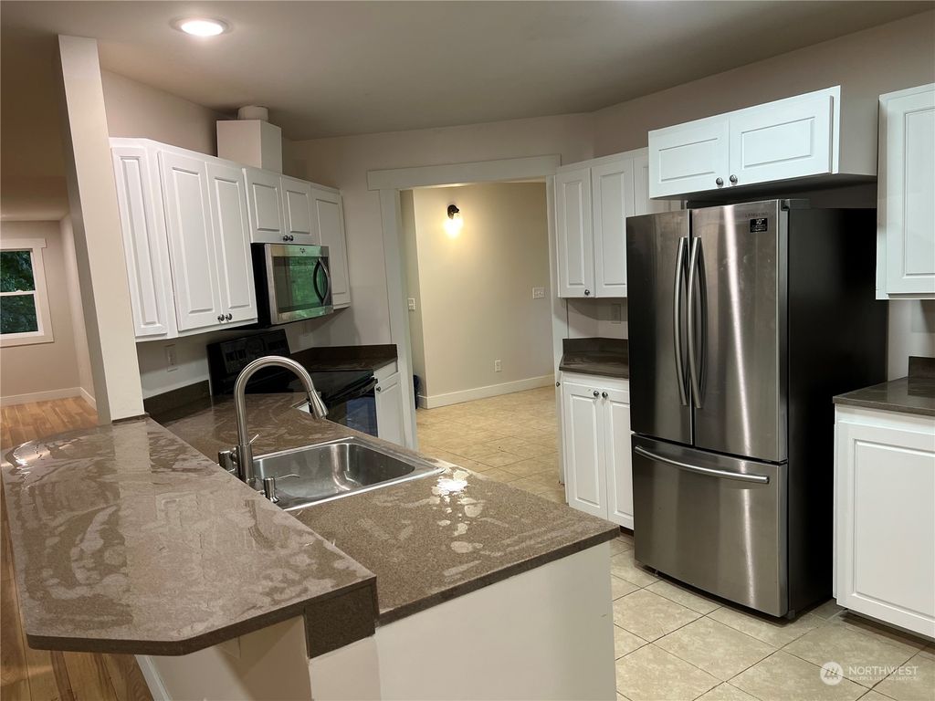 Photo of 8229 S 132nd Street, Seattle, WA 98178 (MLS # 2020803)
