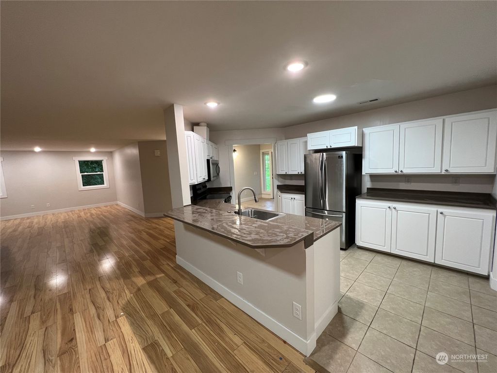Photo of 8229 S 132nd Street, Seattle, WA 98178 (MLS # 2020803)