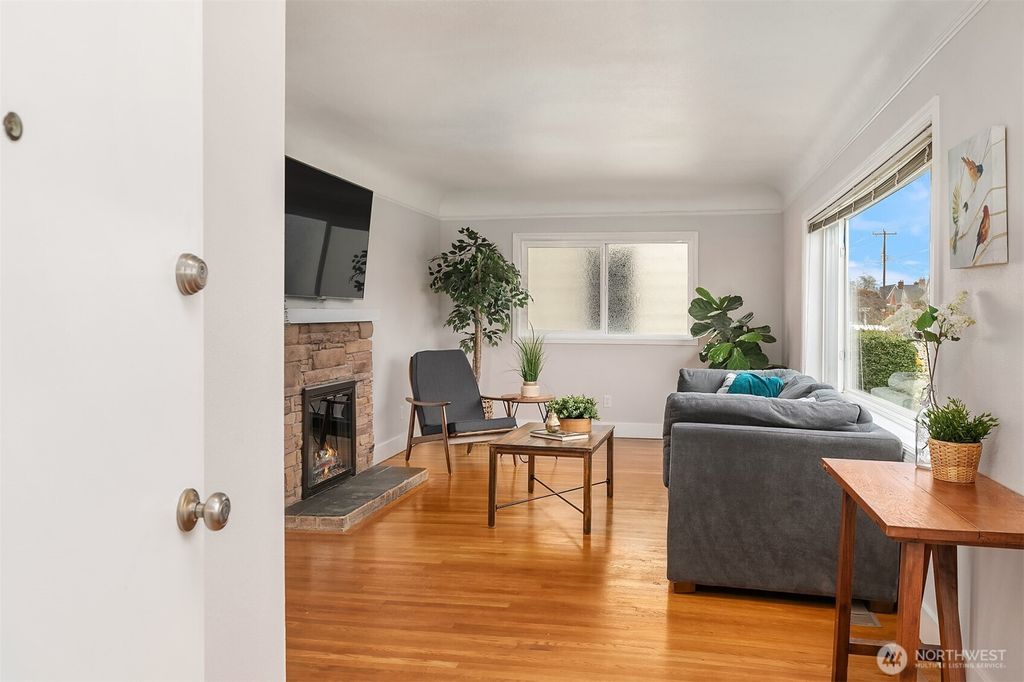Photo of 4011 35th Avenue SW, Seattle, WA 98126 (MLS # 2346603)
