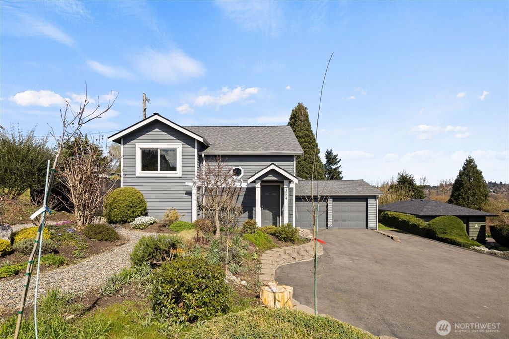 Photo of 4804 S 144th Street, Tukwila, WA 98168 (MLS # 2499047)