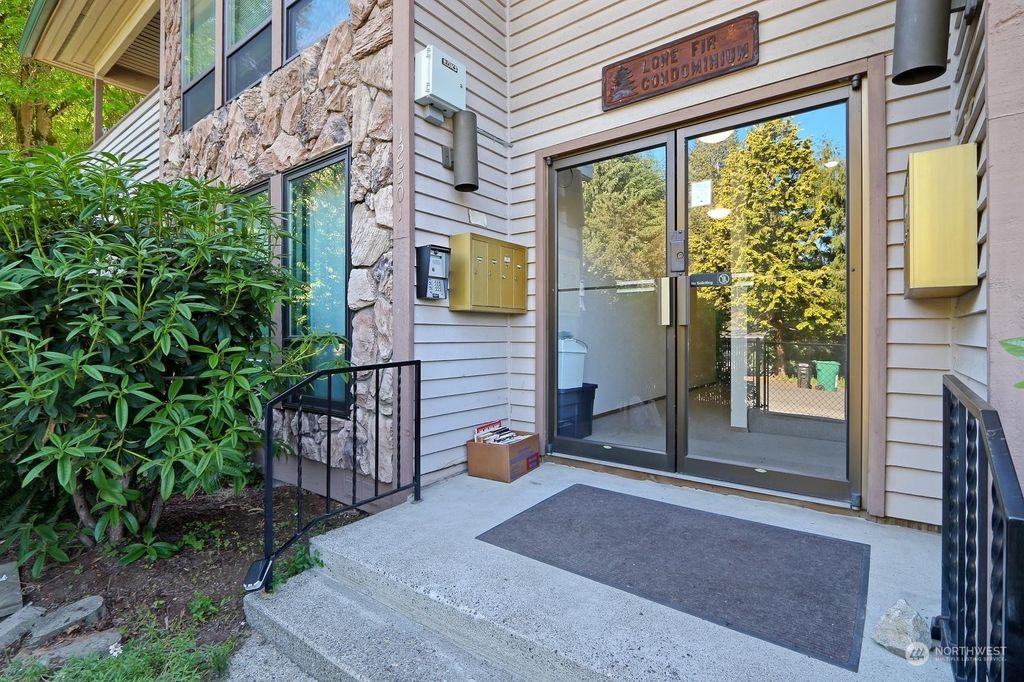 Photo of 12501 17th Avenue NE #A, Seattle, WA 98125 (MLS # 2073914)
