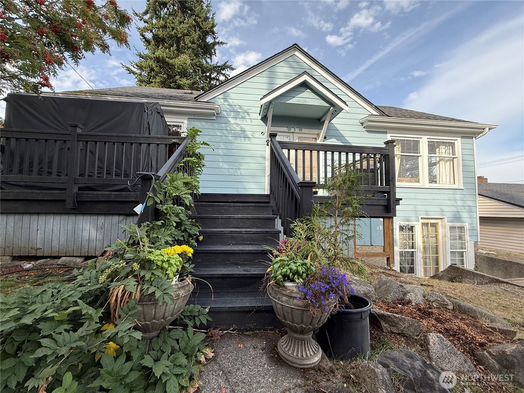 Photo of 618 N 125th Street, Seattle, WA 98133 (MLS # 2443898)