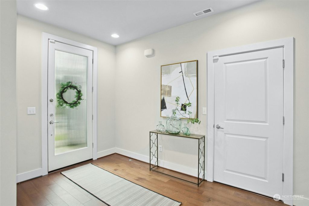 Photo of 5105 NE 12th St St, Renton, WA 98059 (MLS # 2320930)