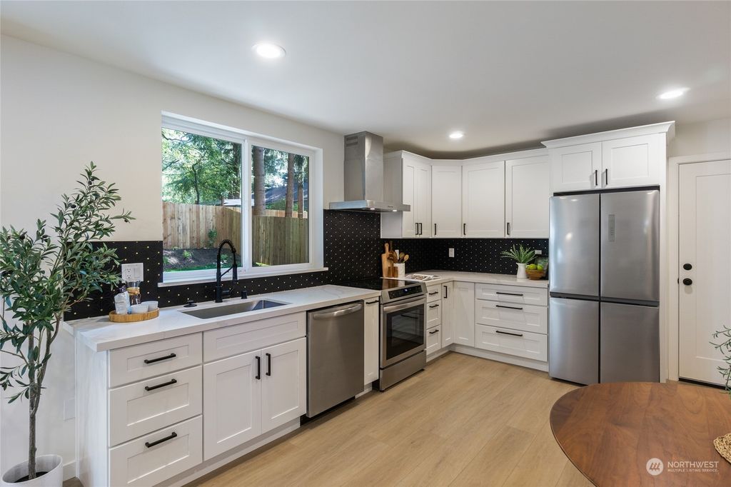 Photo of 3814 NE 115th Street, Seattle, WA 98125 (MLS # 2294831)