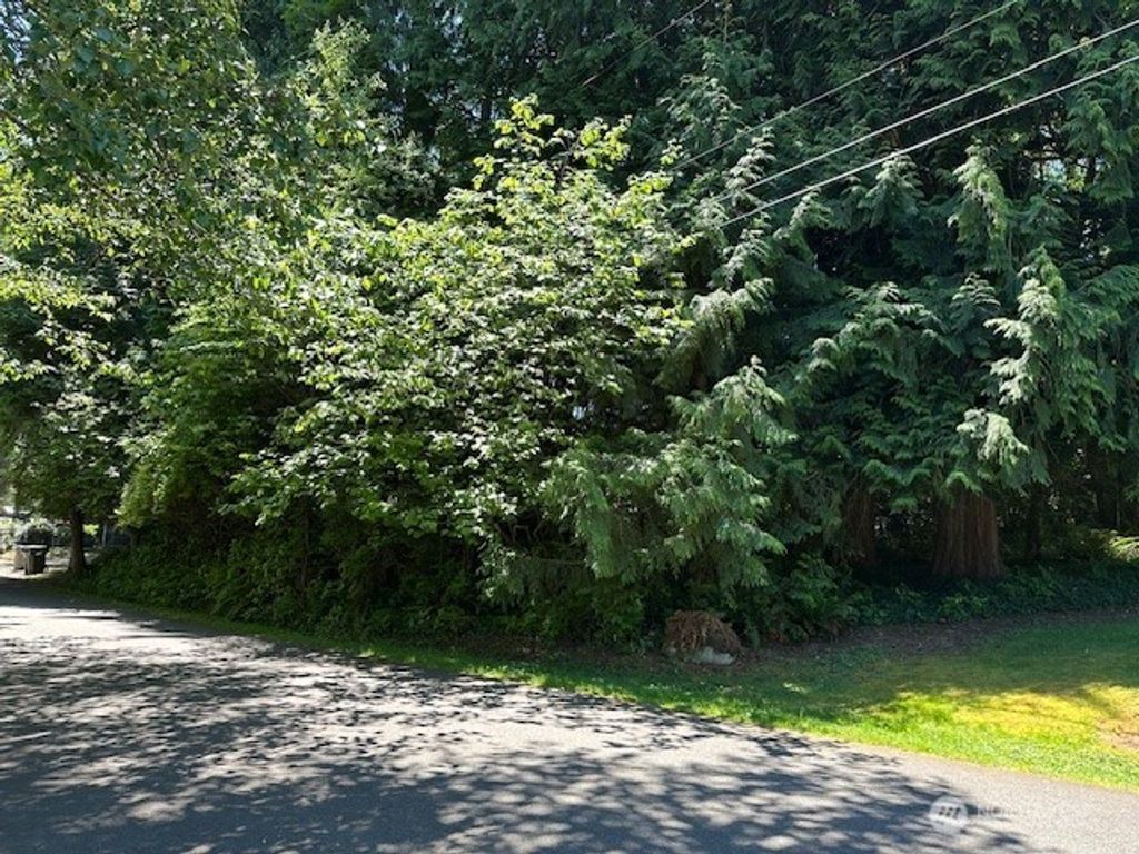 Photo of 13705 W Lake Kathleen Drive SE, Renton, WA 98039 (MLS # 2389793)