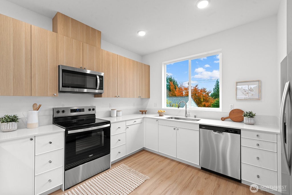 Photo of 1419 SW 111th Lane, Seattle, WA 98164 (MLS # 2570307)