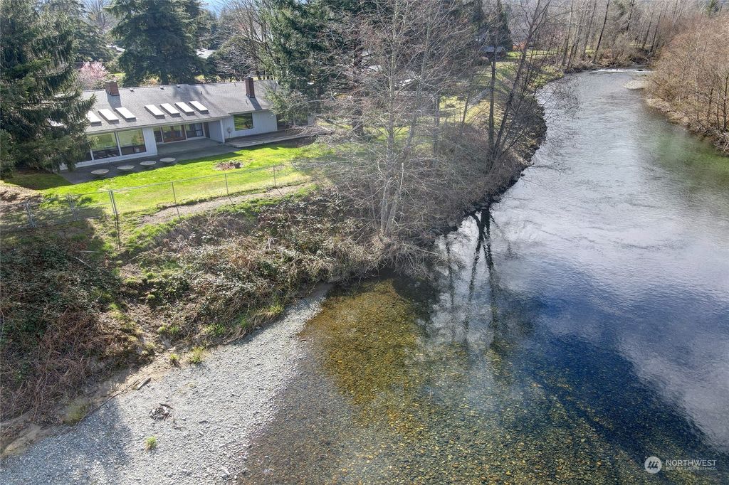 Photo of 925 Riverside Drive SE, North Bend, WA 98045 (MLS # 2049594)
