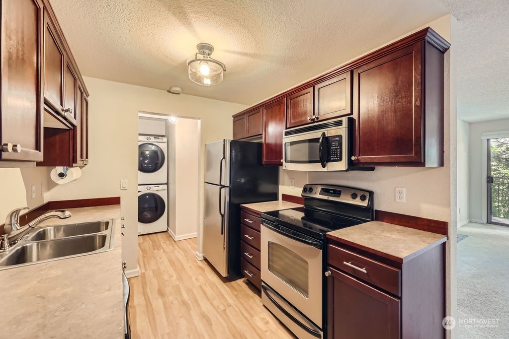 Photo of 750 N 143rd Street #202, Seattle, WA 98133 (MLS # 2257388)