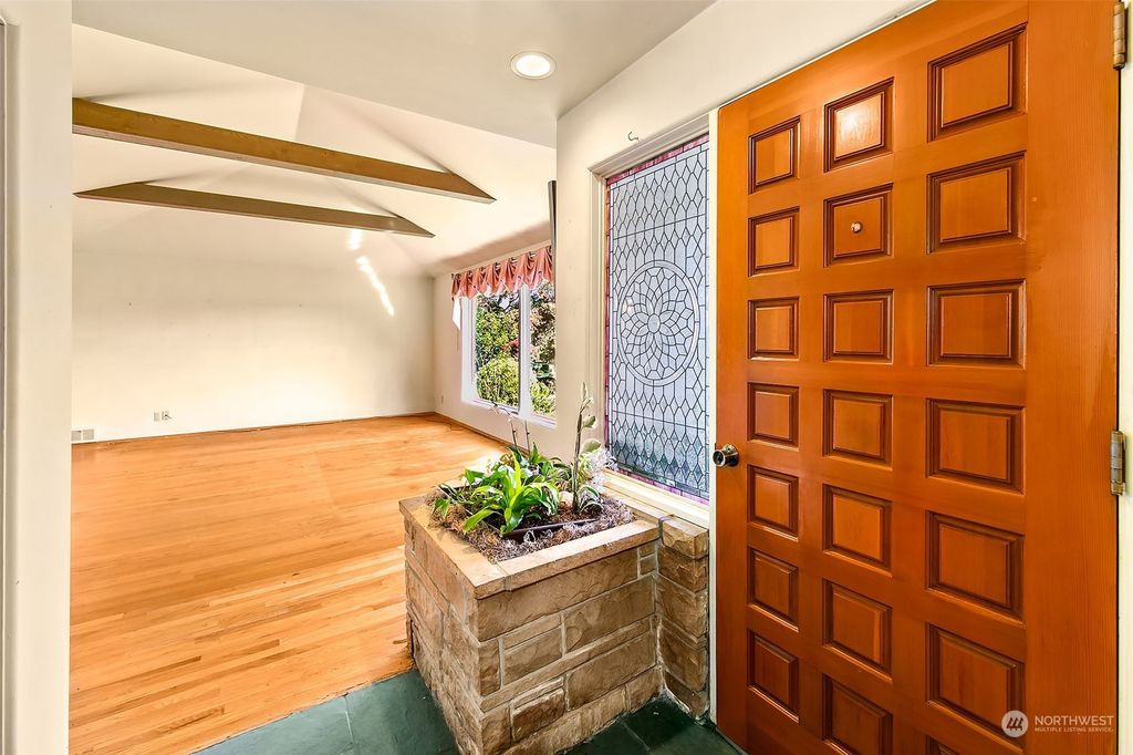 Photo of 10515 11th Avenue NW, Seattle, WA 98177 (MLS # 2164439)