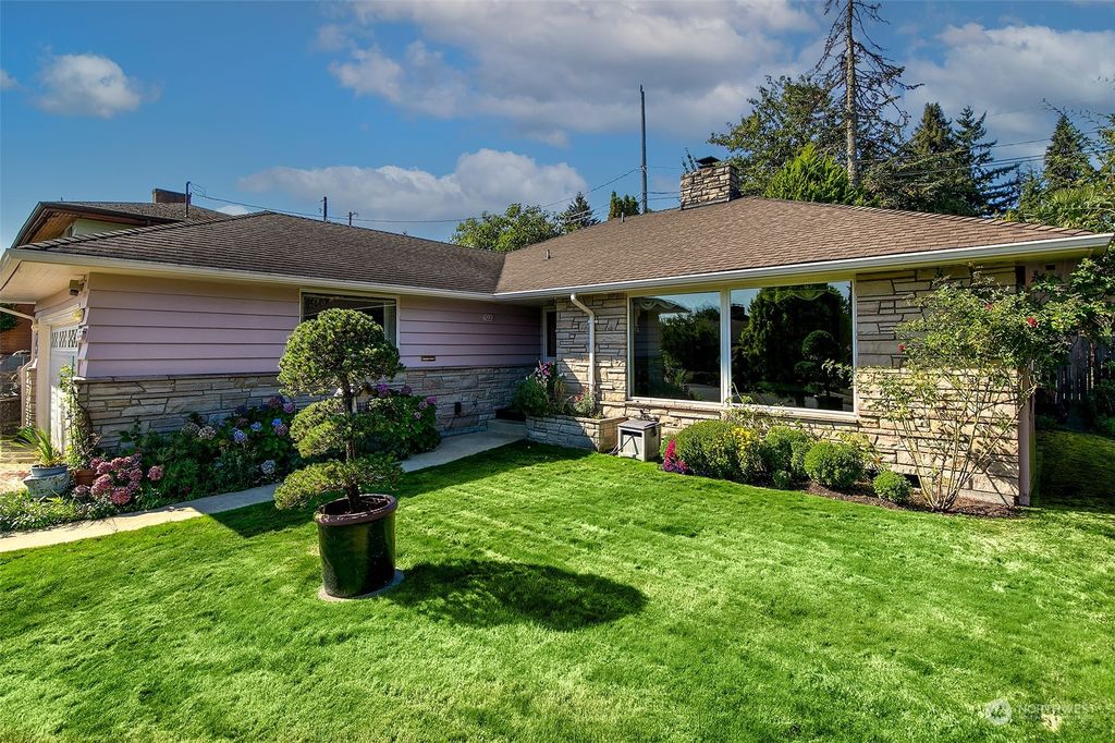 Photo of 10515 11th Avenue NW, Seattle, WA 98177 (MLS # 2164439)