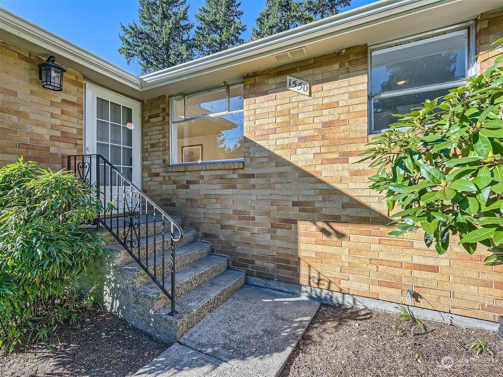 Photo of 1550 NE 106th Street, Seattle, WA 98125 (MLS # 2215395)