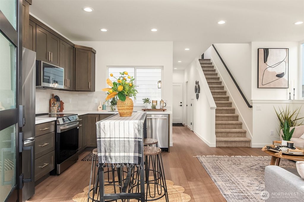 Photo of 12002 20th Street NE #3, Seattle, WA 98125 (MLS # 2454499)