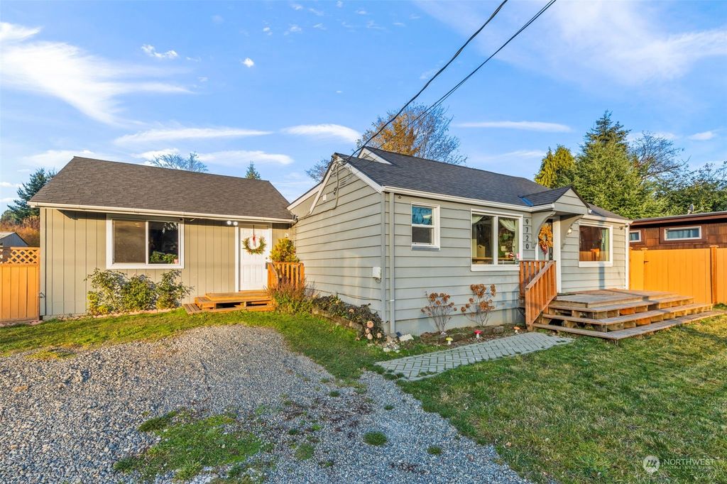 Photo of 9720 30th Avenue SW, Seattle, WA 98126 (MLS # 2314824)