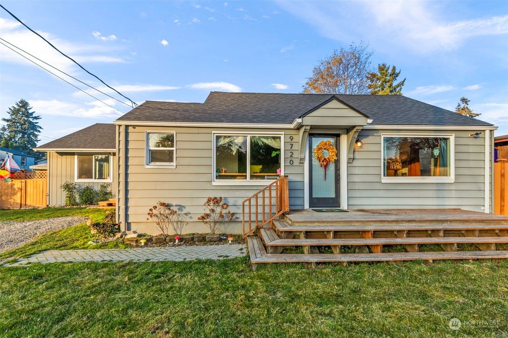 Photo of 9720 30th Avenue SW, Seattle, WA 98126 (MLS # 2314824)