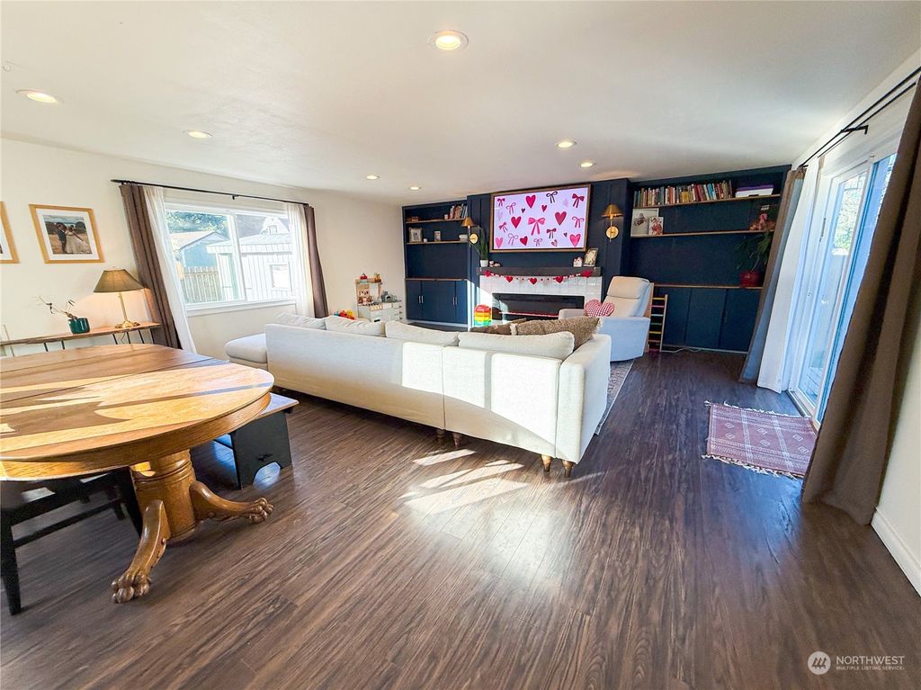 Photo of 9720 30th Avenue SW, Seattle, WA 98126 (MLS # 2314824)