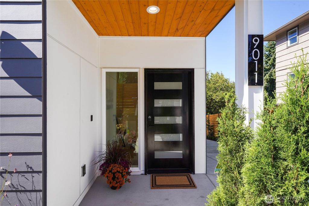 Photo of 9011 14th Avenue SW, Seattle, WA 98106 (MLS # 2479622)