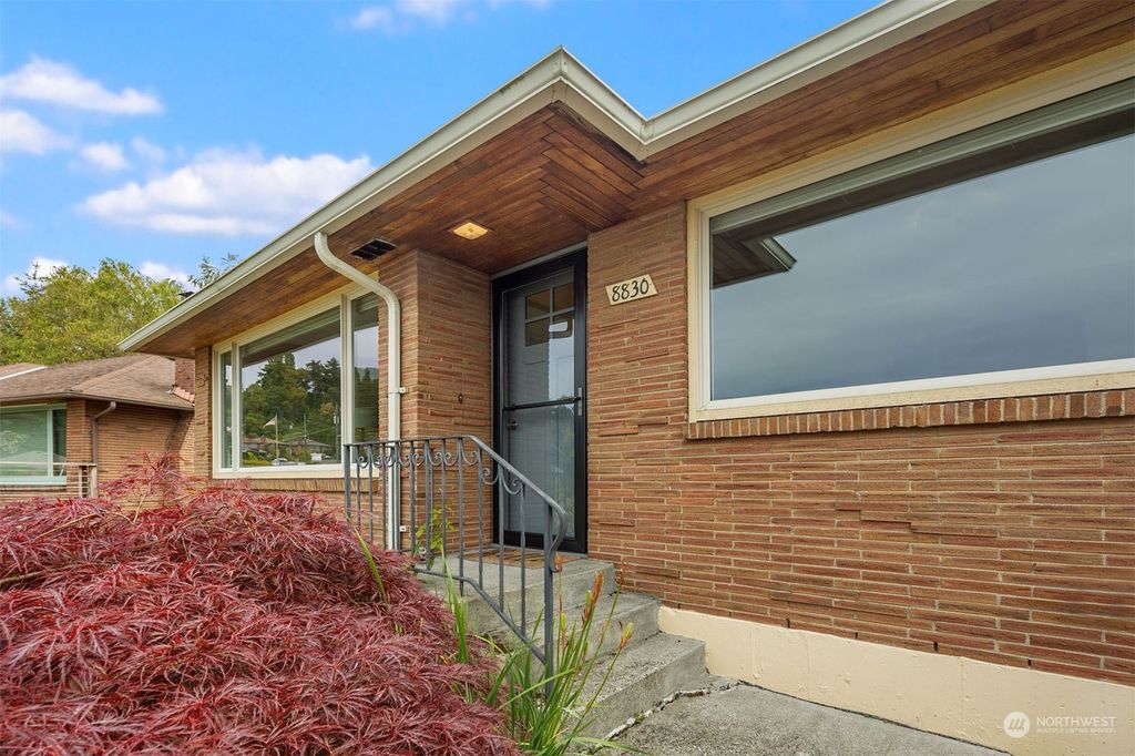 Photo of 8830 40th Avenue SW, Seattle, WA 98136 (MLS # 2248438)