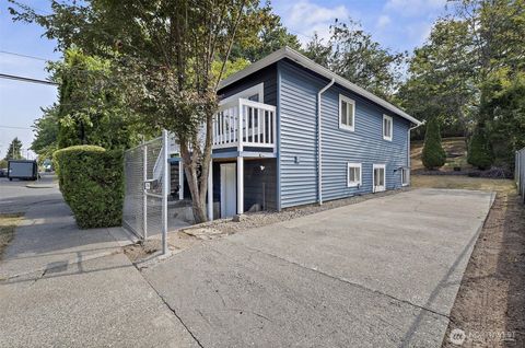 Photo of 4700 26th Avenue SW, Seattle, WA 98106 (MLS # 2415695)