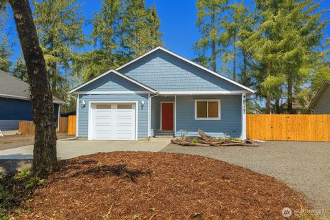 Photo of 387 Duck Lake Drive NE, Ocean Shores, WA 98569 (MLS # 2428340)