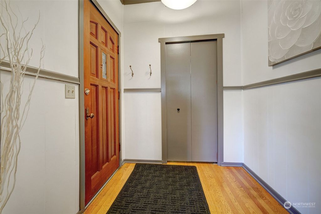 Photo of 8217 Ashworth Avenue N, Seattle, WA 98103 (MLS # 2063056)